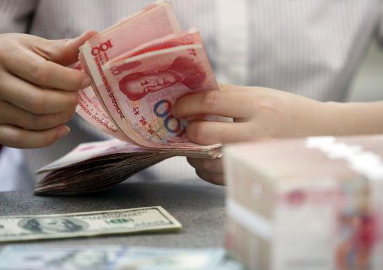 China scraps reserve requirement for forward forex trading